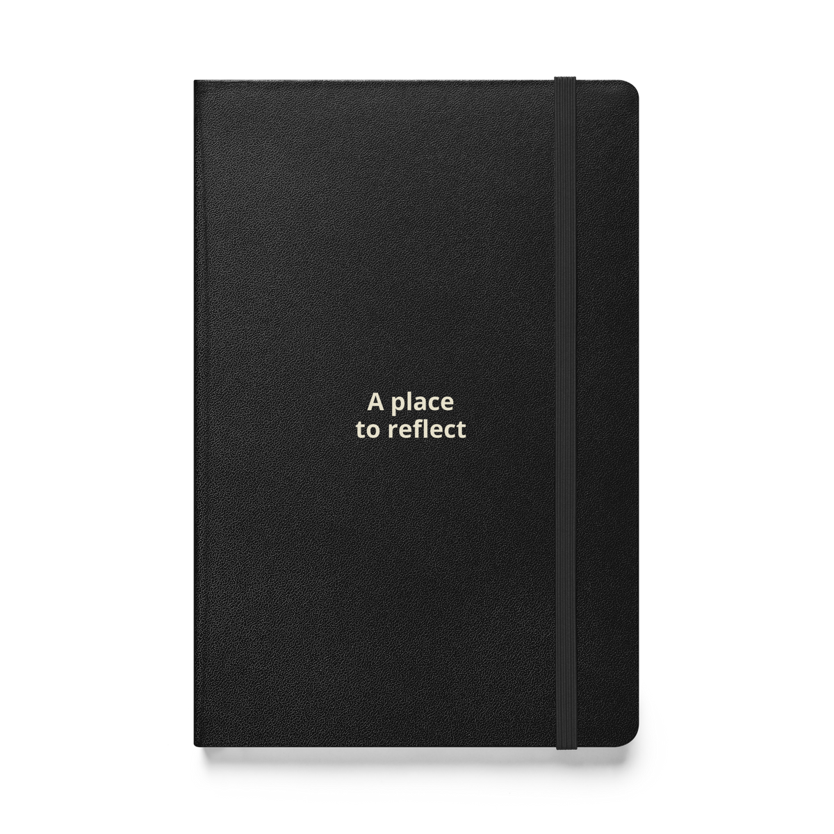 Supplier-generated mockup of the saved A Place to Reflect design: black hardcover journal with two lines of warm cream lettering, an elastic closure, and no additional gifts.